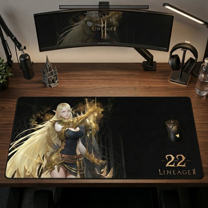 Gaming desk setup with a monitor, mouse, and mouse pad featuring Lineage II artwork.